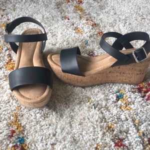 Cork wedge black strapped comfort shoe.